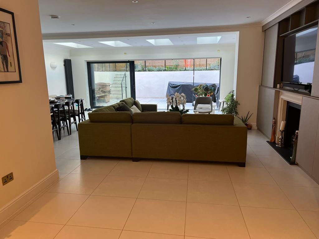 Comfy living area in Kilburn basement